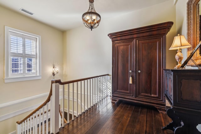 224 3rd Ave S, Franklin, TN 37064 - corridor featuring an upstairs landing, wood-type flooring, and a chandelier