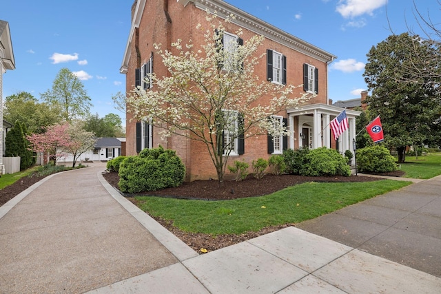 224 3rd Ave S, Franklin, TN 37064 - view of front of property with brick siding and a front yard