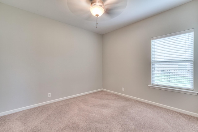 5115 Heroes Ln, Murfreesboro, TN 37129 - unfurnished room featuring light colored carpet, baseboards, and a ceiling fan
