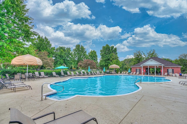 5115 Heroes Ln, Murfreesboro, TN 37129 - community pool with a patio area and view of scattered trees