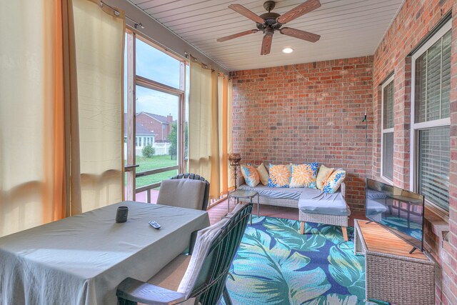 5115 Heroes Ln, Murfreesboro, TN 37129 - sunroom / solarium with brick wall, ceiling fan, an outdoor hangout area, and wood ceiling