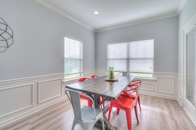 5115 Heroes Ln, Murfreesboro, TN 37129 - dining room with a wainscoted wall, light wood-style flooring, ornamental molding, recessed lighting, and a decorative wall