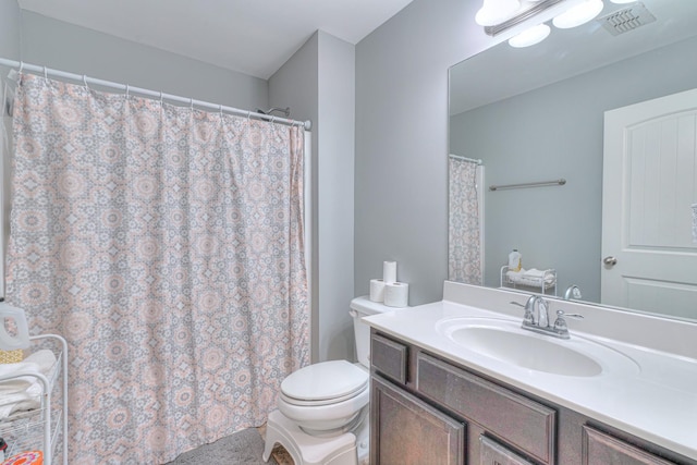 5115 Heroes Ln, Murfreesboro, TN 37129 - bathroom with vanity, toilet, and a shower with shower curtain