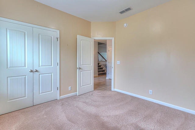 5115 Heroes Ln, Murfreesboro, TN 37129 - unfurnished bedroom featuring carpet flooring, baseboards, and a closet