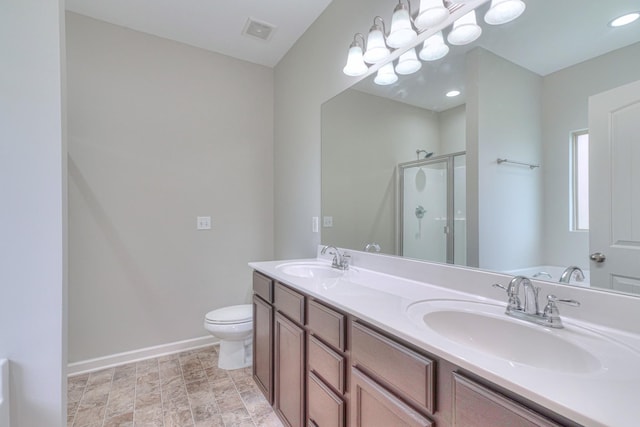 5115 Heroes Ln, Murfreesboro, TN 37129 - full bath with a shower stall, double vanity, toilet, and baseboards
