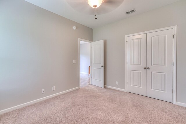 5115 Heroes Ln, Murfreesboro, TN 37129 - unfurnished bedroom with carpet floors, baseboards, a closet, and a ceiling fan
