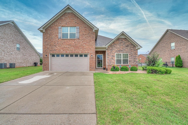 5115 Heroes Ln, Murfreesboro, TN 37129 - traditional home featuring an attached garage, central AC, driveway, and brick siding
