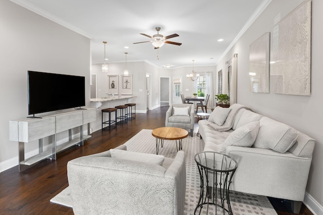 6061 Starboard Ln, Franklin, TN 37064 - living room with dark wood-type flooring, a ceiling fan, baseboards, ornamental molding, and recessed lighting