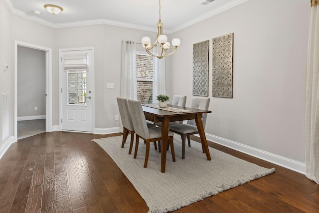 6061 Starboard Ln, Franklin, TN 37064 - dining room featuring a chandelier, hardwood / wood-style flooring, crown molding, and baseboards