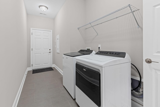 6061 Starboard Ln, Franklin, TN 37064 - washroom with independent washer and dryer and baseboards
