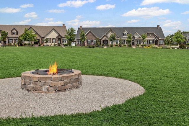 6061 Starboard Ln, Franklin, TN 37064 - view of front facade featuring an outdoor fire pit and a front lawn