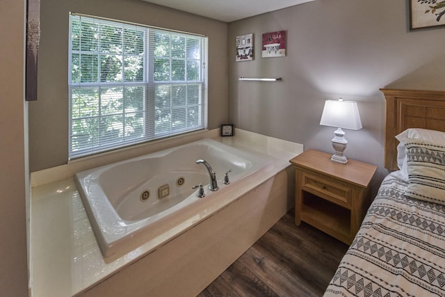 818 Golf View Blvd Unit 1303, Pigeon Forge, TN 37863 - bathroom featuring wood finished floors and a tub with jets