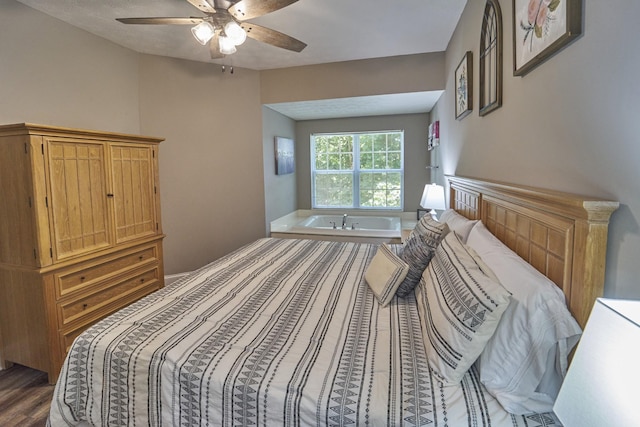 818 Golf View Blvd Unit 1303, Pigeon Forge, TN 37863 - bedroom featuring a ceiling fan and wood finished floors