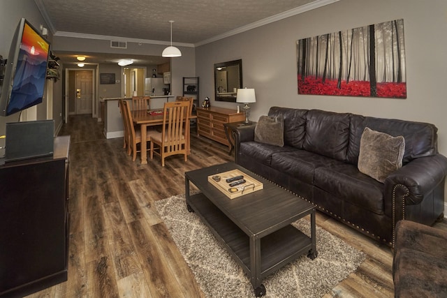818 Golf View Blvd Unit 1303, Pigeon Forge, TN 37863 - living area featuring wood finished floors, ornamental molding, and a textured ceiling