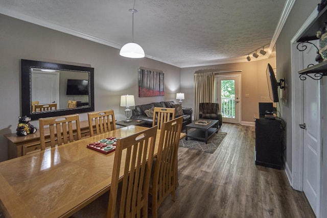 818 Golf View Blvd Unit 1303, Pigeon Forge, TN 37863 - dining space with a textured ceiling, dark wood finished floors, ornamental molding, and baseboards