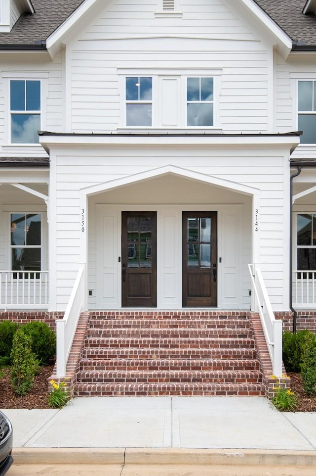 3150 Long Branch Cir, Franklin, TN 37064 - entrance to property with roof with shingles and covered porch