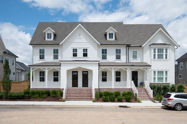 3150 Long Branch Cir, Franklin, TN 37064 - view of property with covered porch, stairs, and roof with shingles