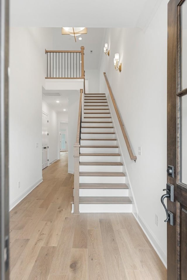 3150 Long Branch Cir, Franklin, TN 37064 - foyer with stairs, wood finished floors, and baseboards