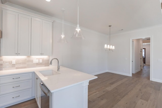 3168 Long Branch Cir, Franklin, TN 37064 - kitchen with a sink, dishwasher, ornamental molding, light wood-style flooring, and light countertops