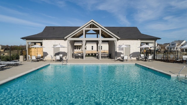 3168 Long Branch Cir, Franklin, TN 37064 - back of house with a patio, a community pool, and brick siding