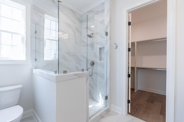 3168 Long Branch Cir, Franklin, TN 37064 - full bathroom with a spacious closet, toilet, a shower stall, and baseboards