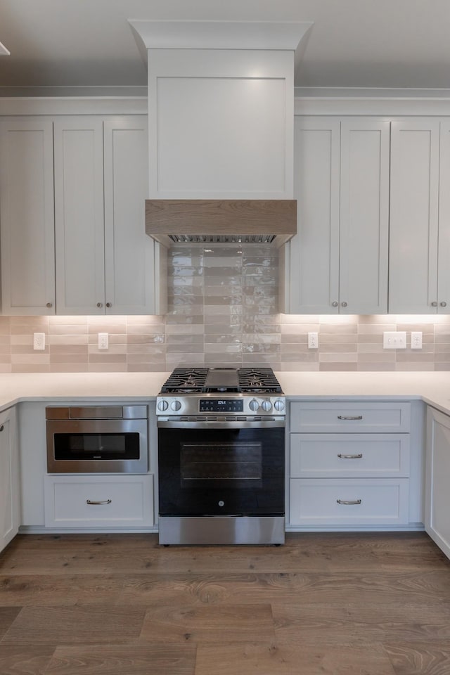 3168 Long Branch Cir, Franklin, TN 37064 - kitchen featuring stainless steel gas range, white cabinets, and light countertops