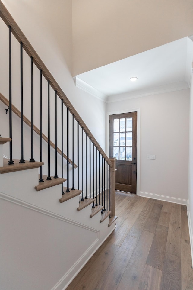 3168 Long Branch Cir, Franklin, TN 37064 - entryway with wood-type flooring, crown molding, stairs, baseboards, and recessed lighting