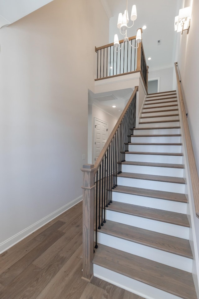3168 Long Branch Cir, Franklin, TN 37064 - staircase with wood finished floors, crown molding, a chandelier, baseboards, and a towering ceiling