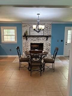 1704 Deer Hollow Dr W, Lawrenceburg, TN 38464 - dining area with light tile patterned floors, a chandelier, and crown molding