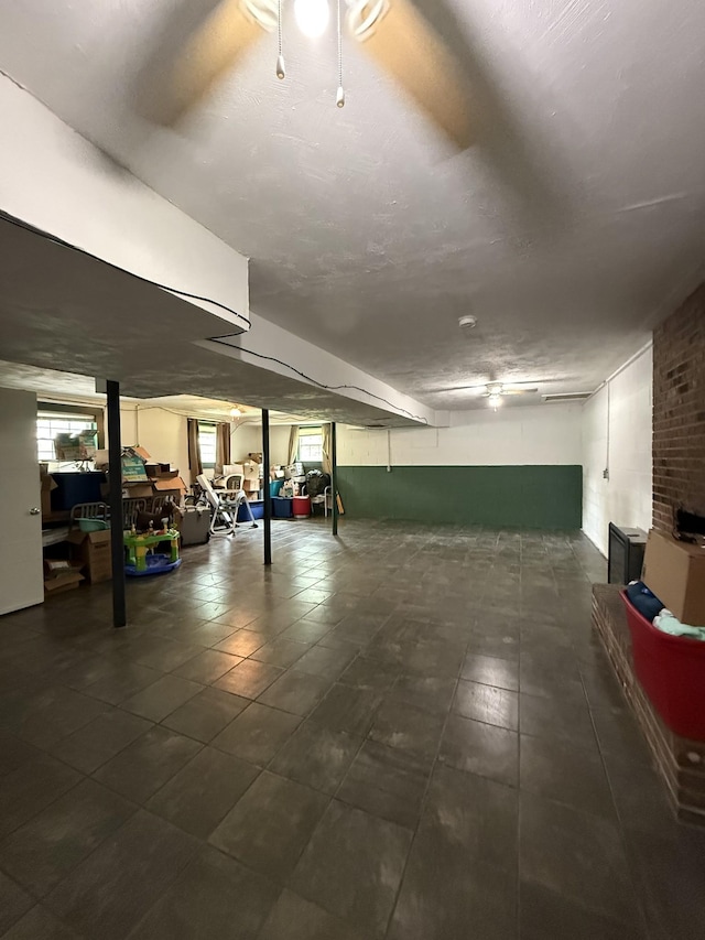 1704 Deer Hollow Dr W, Lawrenceburg, TN 38464 - basement featuring dark tile patterned flooring