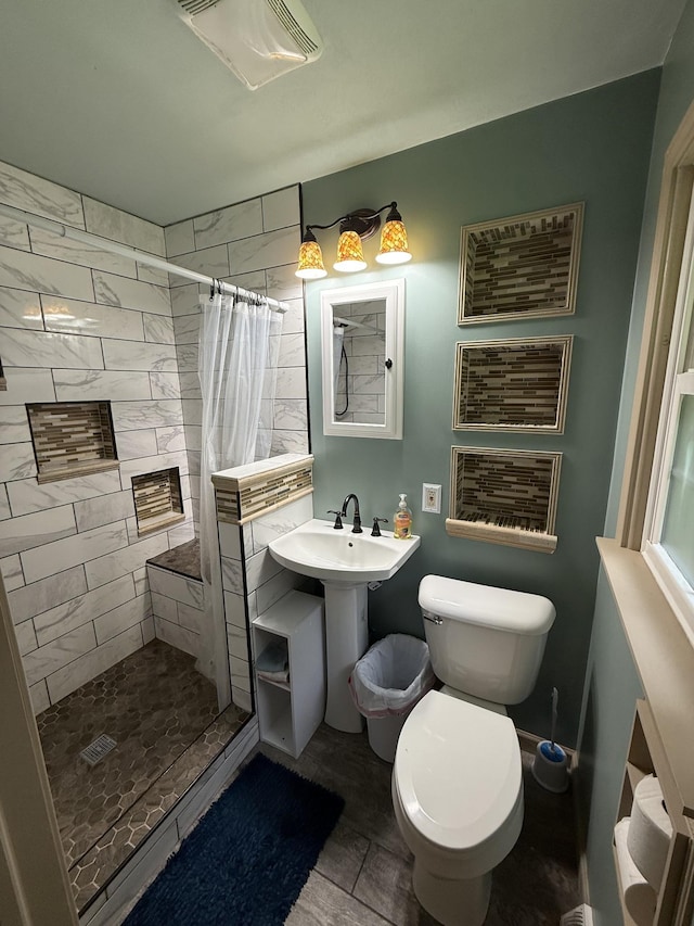 1704 Deer Hollow Dr W, Lawrenceburg, TN 38464 - bathroom featuring a stall shower and toilet
