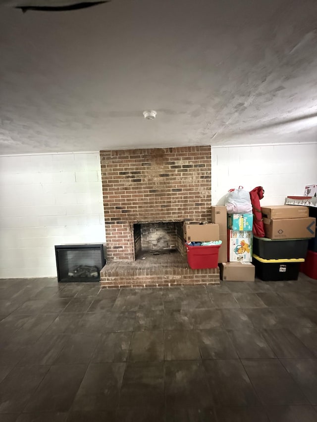 1704 Deer Hollow Dr W, Lawrenceburg, TN 38464 - living room with a fireplace and concrete block wall