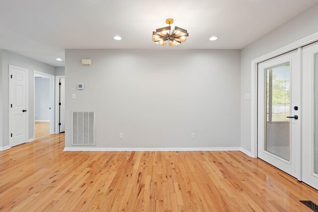 2952 Carters Creek Station Rd, Columbia, TN 38401 - spare room featuring light wood finished floors, recessed lighting, baseboards, and a chandelier