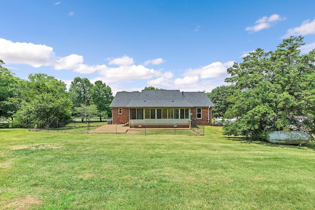 2952 Carters Creek Station Rd, Columbia, TN 38401 - back of house with brick siding, a patio, and a sunroom