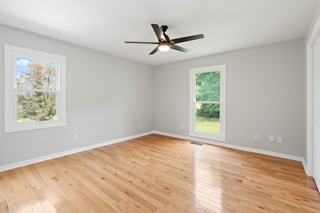 2952 Carters Creek Station Rd, Columbia, TN 38401 - spare room featuring light wood-type flooring, a ceiling fan, and baseboards