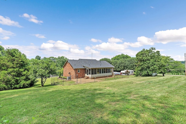 2952 Carters Creek Station Rd, Columbia, TN 38401 - view of green lawn featuring a sunroom