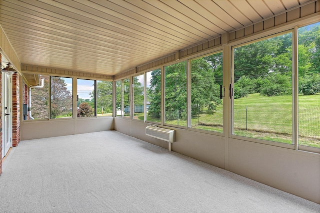 2952 Carters Creek Station Rd, Columbia, TN 38401 - unfurnished sunroom featuring view of wooded area and a wall mounted AC