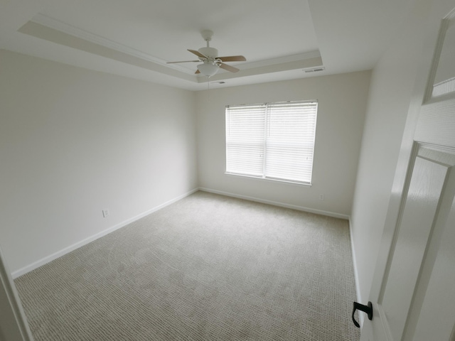 307 Fletcher Ct, Franklin, TN 37067 - spare room with a raised ceiling, a ceiling fan, carpet floors, and baseboards