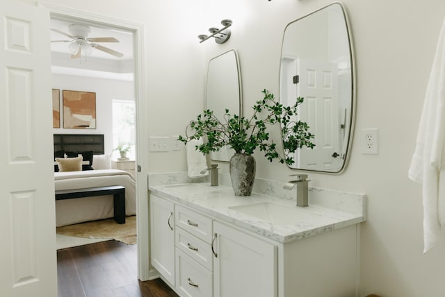 307 Fletcher Ct, Franklin, TN 37067 - ensuite bathroom with double vanity, wood finished floors, and a ceiling fan