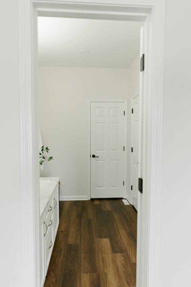 307 Fletcher Ct, Franklin, TN 37067 - corridor with dark wood finished floors and baseboards