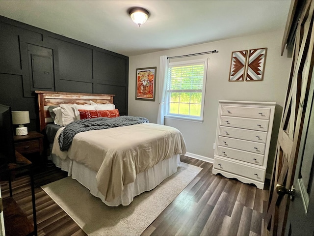 831 Harris Rd, Dickson, TN 37055 - bedroom featuring dark wood-type flooring and baseboards