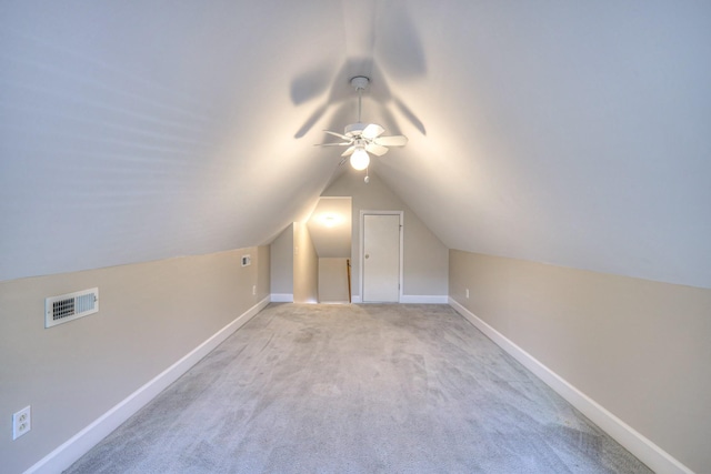 1030 Meandering Way, Franklin, TN 37067 - additional living space with ceiling fan, vaulted ceiling, light colored carpet, and baseboards