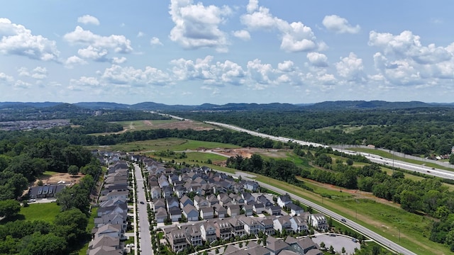 1030 Meandering Way, Franklin, TN 37067 - aerial view of residential area featuring a mountainous background