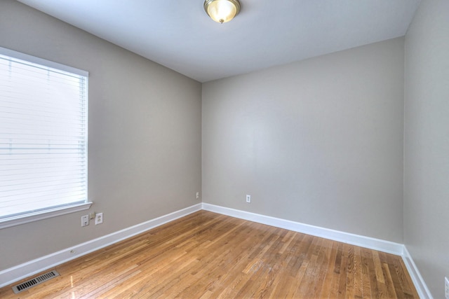 1030 Meandering Way, Franklin, TN 37067 - spare room featuring light wood-style flooring, baseboards, and plenty of natural light