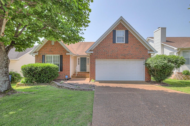 1030 Meandering Way, Franklin, TN 37067 - traditional-style house featuring brick siding, asphalt driveway, a front yard, and a garage