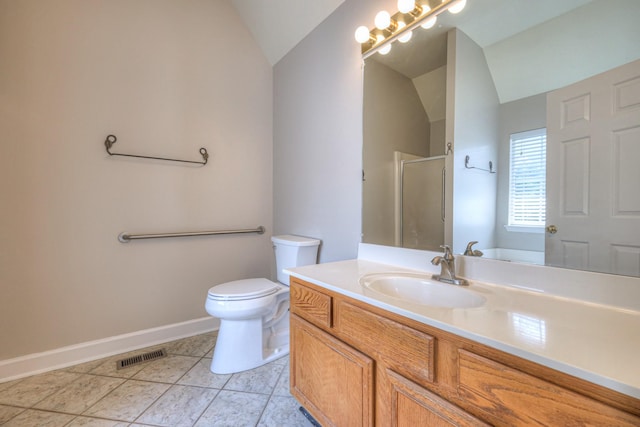 1030 Meandering Way, Franklin, TN 37067 - bathroom with vaulted ceiling, vanity, a shower stall, toilet, and baseboards