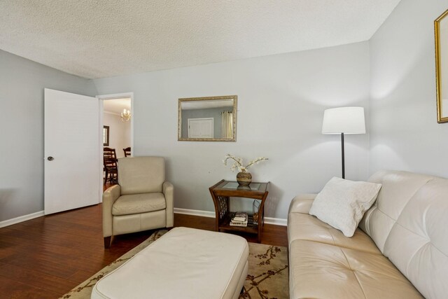 4904 Rainier Dr, Old Hickory, TN 37138 - living area with wood finished floors, a chandelier, baseboards, and a textured ceiling