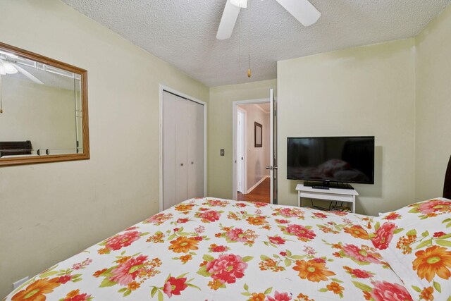 4904 Rainier Dr, Old Hickory, TN 37138 - bedroom with a textured ceiling, a closet, and a ceiling fan