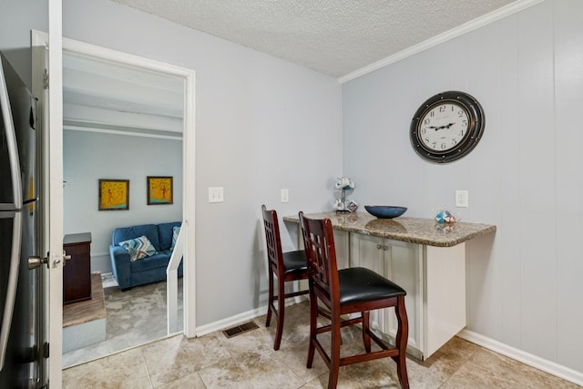 4904 Rainier Dr, Old Hickory, TN 37138 - office featuring crown molding, a textured ceiling, baseboards, and light tile patterned floors