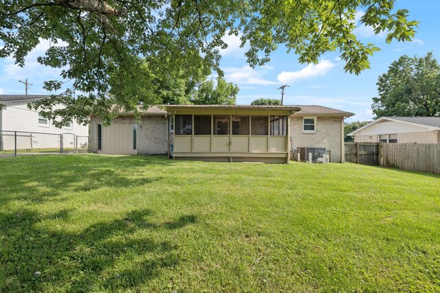 4904 Rainier Dr, Old Hickory, TN 37138 - back of property featuring brick siding and a sunroom